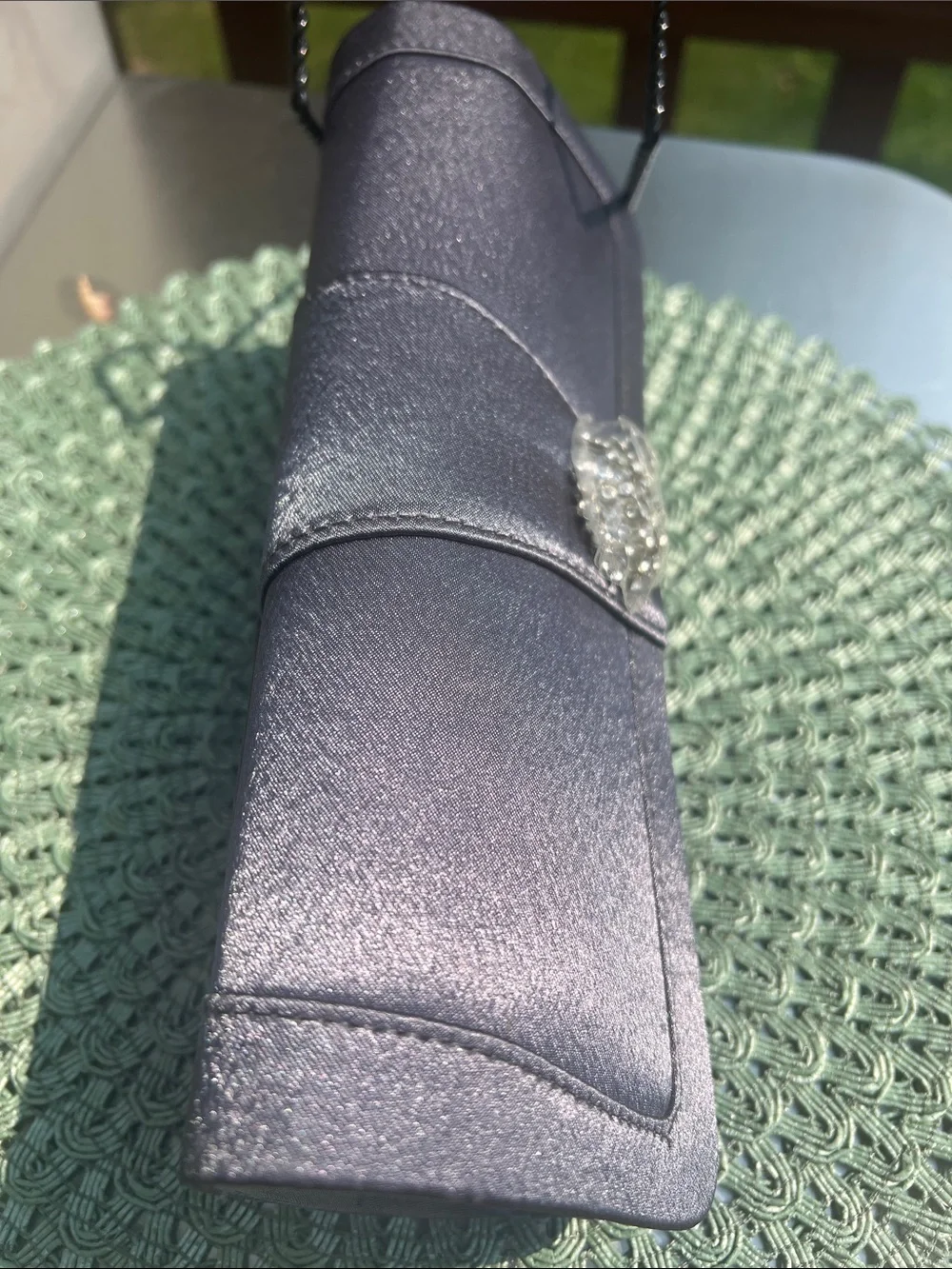 NWOT Gray Evening Clutch with clear crystal embellishment.